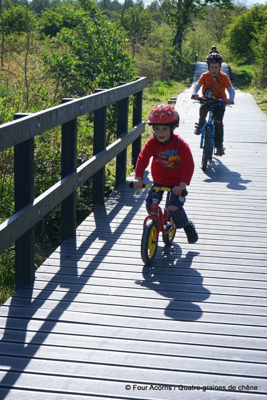Blessington-greenway-children-cycling-boardwalk