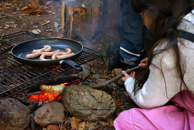 bread-on-stick-sausages-campfire-girl-cooking