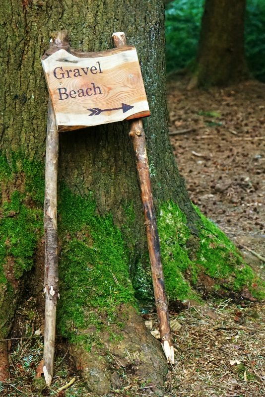 gravel-beach-wooden-sign-tipi-adventures-ireland