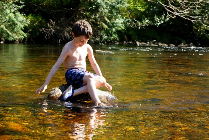 boy-river-rock-avonmore-wicklow-ireland