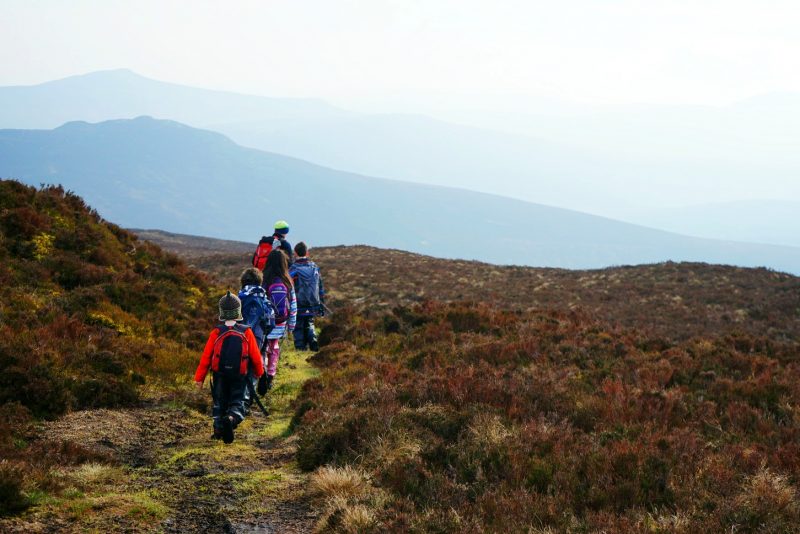 hiking-family-brown-heather-misty-mountains-wicklow-ireland