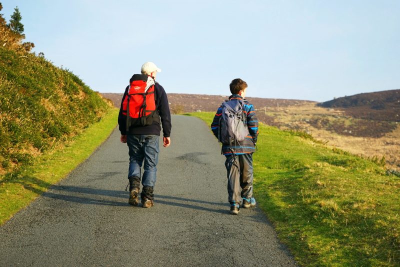father-son-hiking-sunshine-luggala-wicklow-ireland