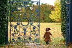 little-prince-autumn-walking-though-blue-gate-Killruddery